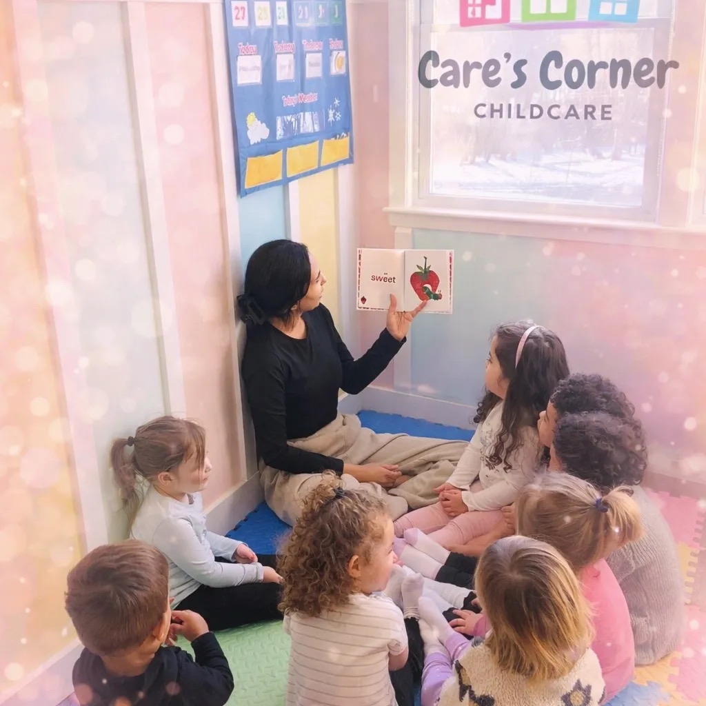 Caroline reading with children at Care's Corner Childcare